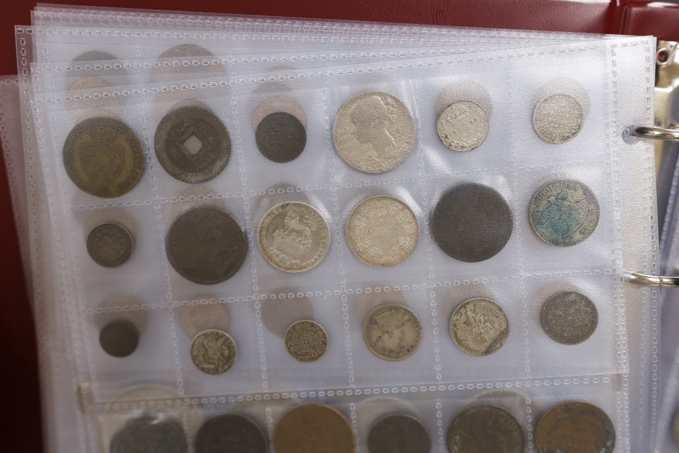An album of British, Commonwealth and world coins including